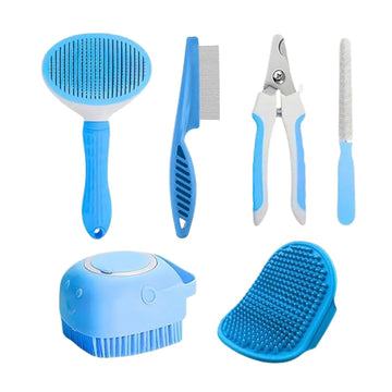 Set of pet grooming tools on a white background